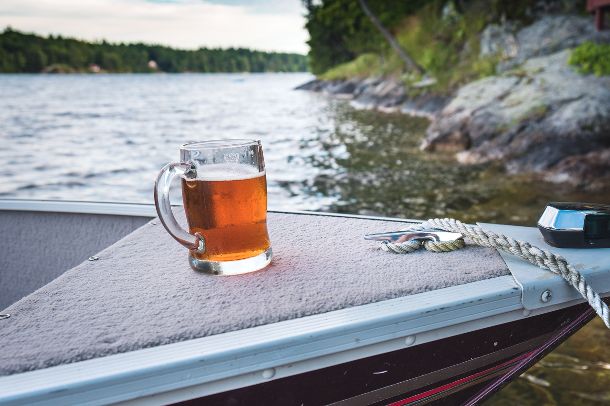 A beer glass on a small boat
