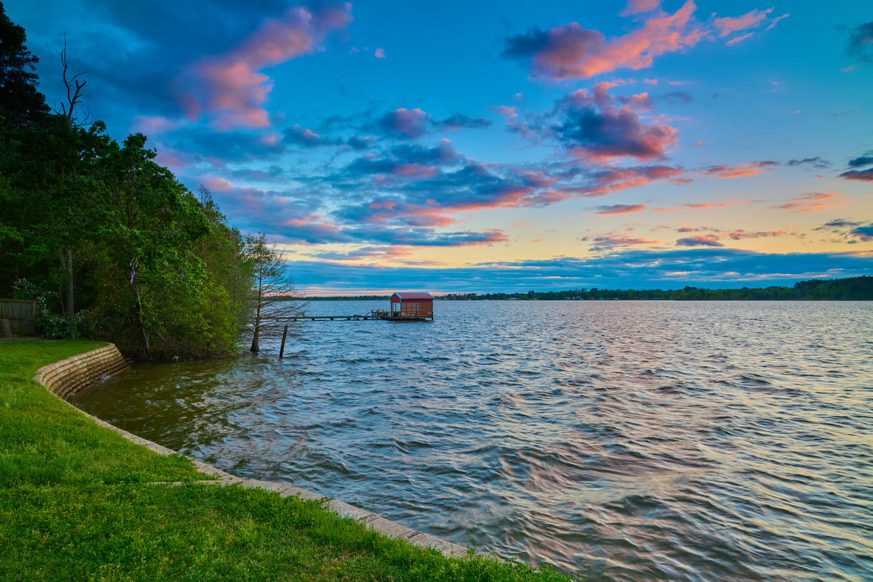 Boathouse on Lake Tyler, Texas with colorful clouds