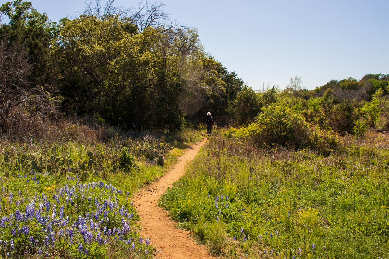 A senior on a footpath in Texas