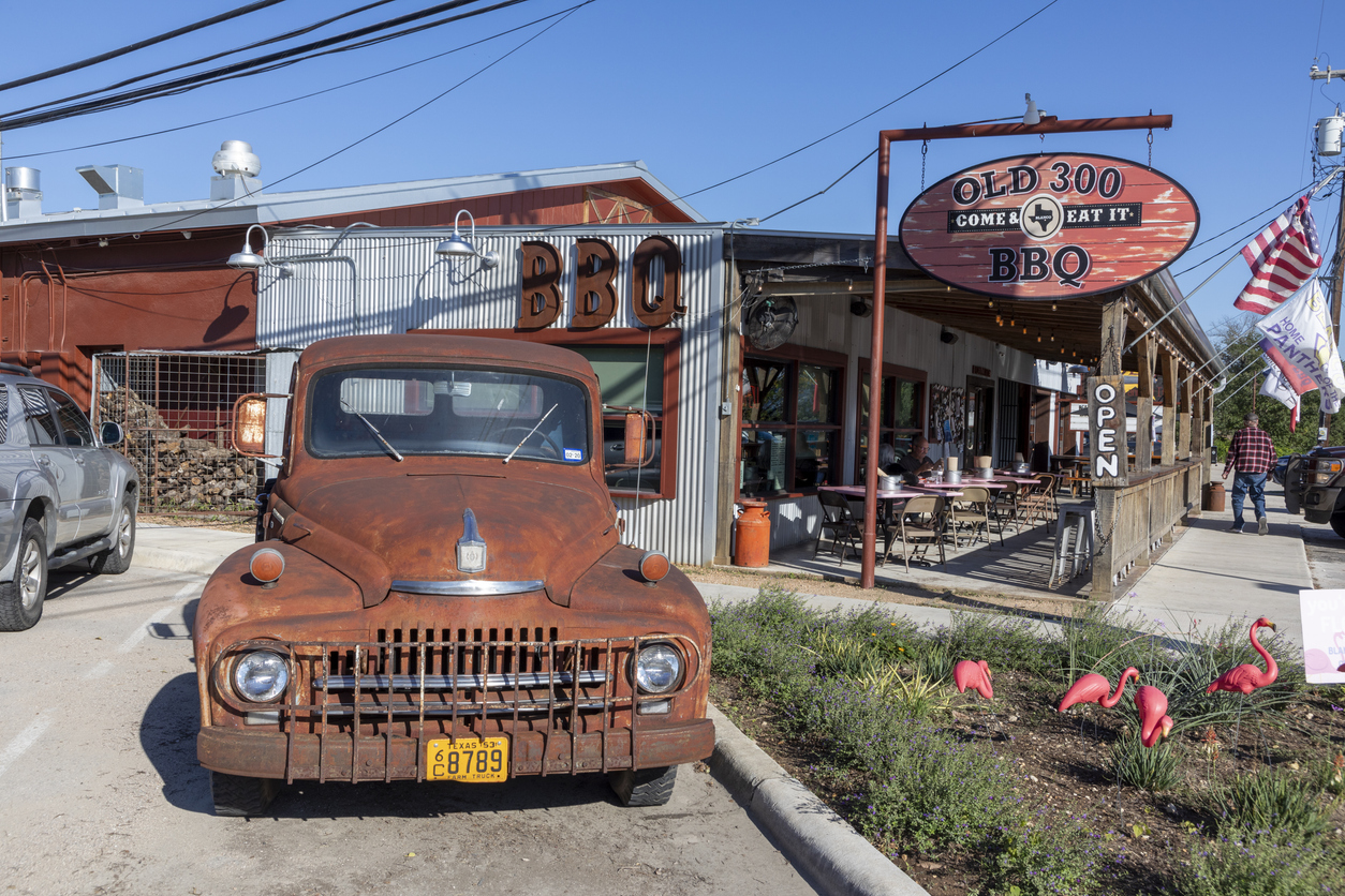 old rusty collectors car at the street in Blanco, Texas