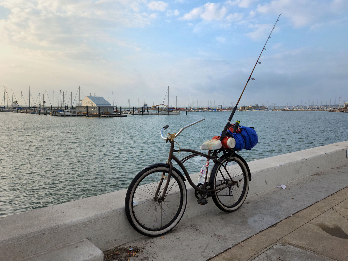Panoramic view of bicycle against Waters Edge Fishing Camp, Corpus Christi