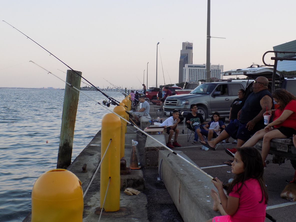 People fishing along the waterfront in Corpus Christi