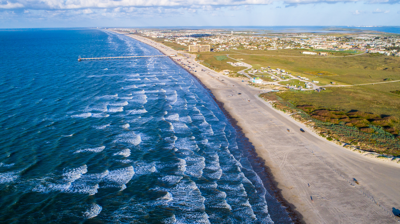 Sunrise on Padre Island from High Drone View with waves crashing along Beach